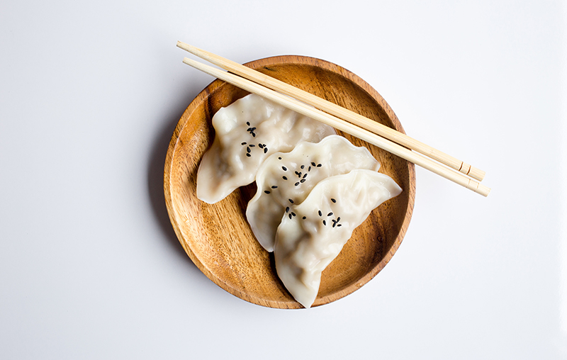 Steamed dumplings wirh chopsticks